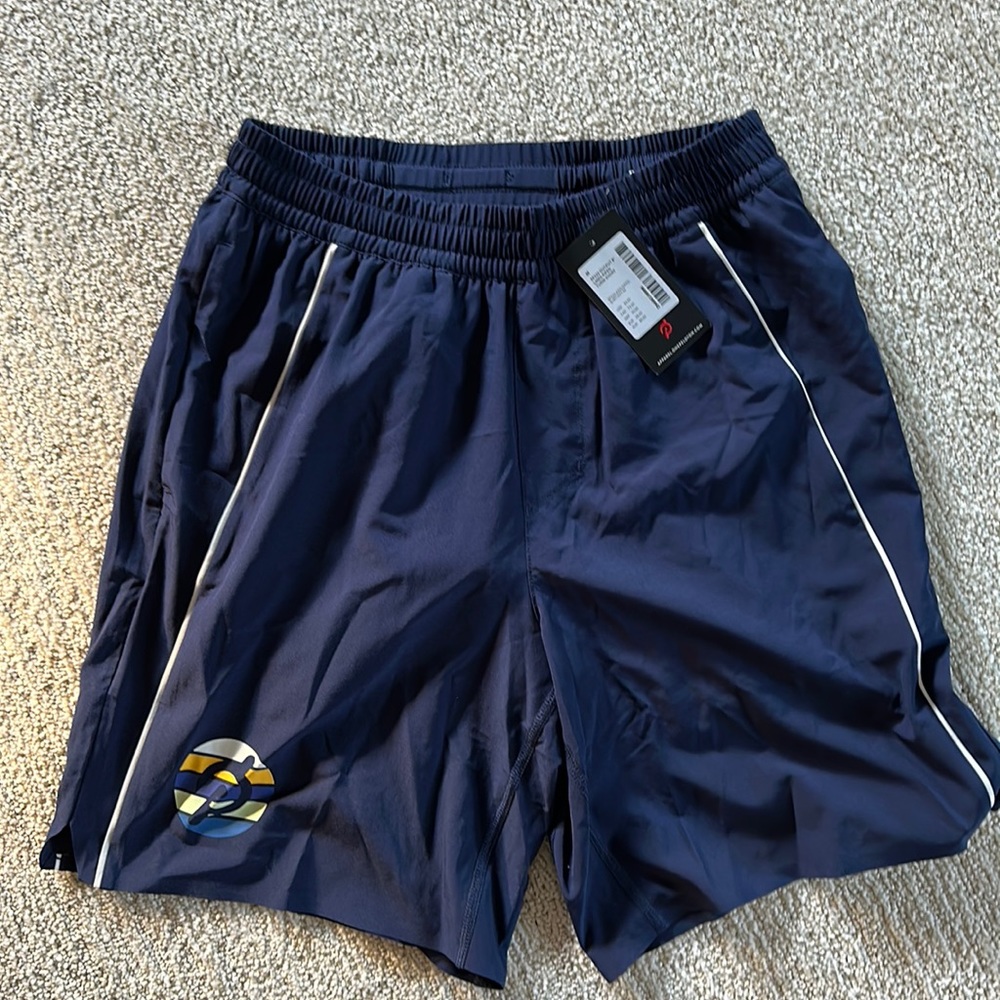 NWT Peloton Output 8" Lined Piped Turin Short